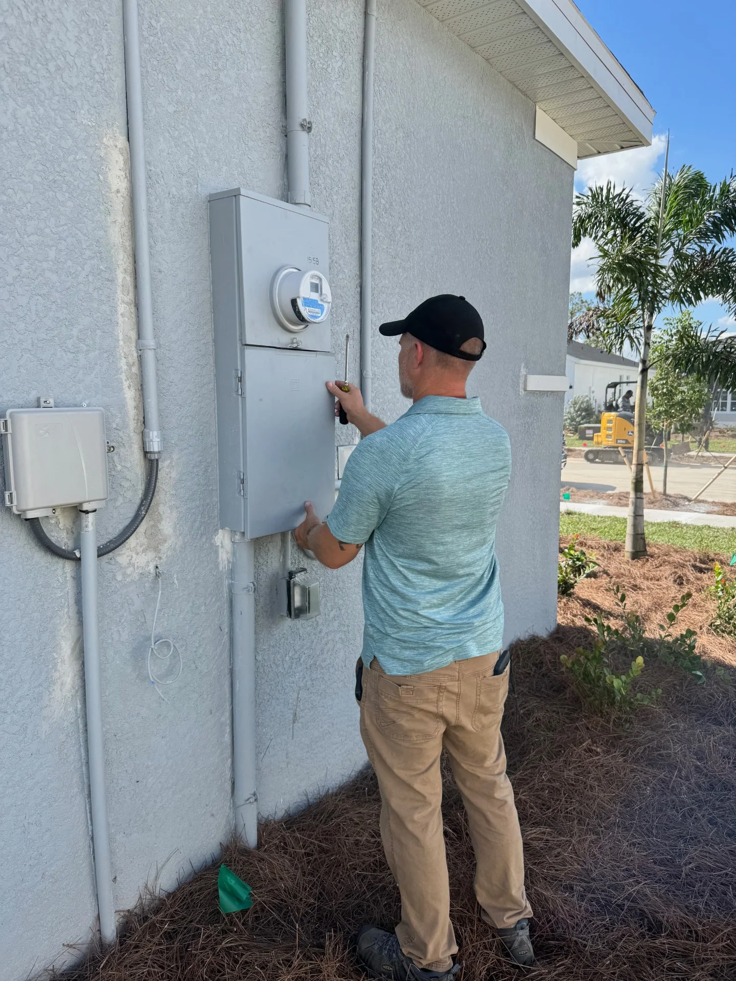 Tim-inspecting-main-service-panel